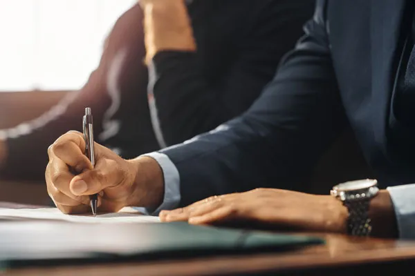 Attorney reviewing documents with a client
